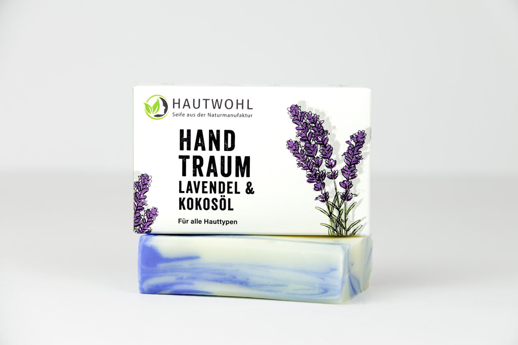 Die Verpackung der Hand Traum Seife mit Lavendel und Kokosöl für alle Hauttypen, ist weiß mit lila Lavendel. Die Seife ist blau und weiß marmoriert. 